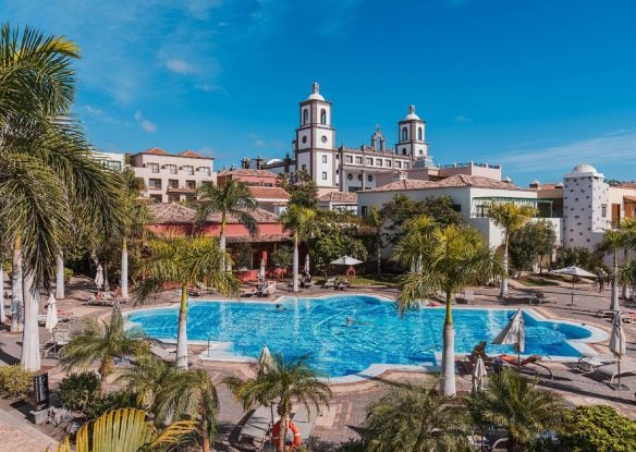 Exterior view of a resort with swimming pool