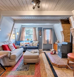living room in an a-frame cabin