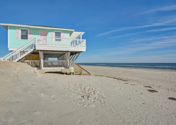 Sandy beach with beach house