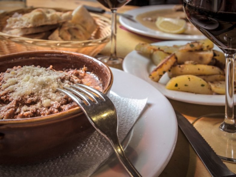 Lasagna with minced meat and parmesan, traditional Italian cuisine
