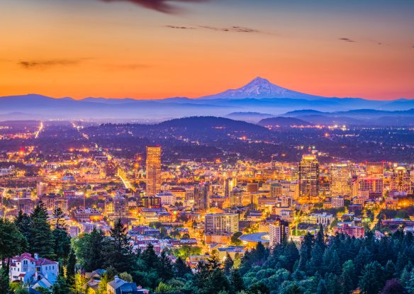 Portland, Oregon, USA downtown skyline with Mt. Hood at dawn.