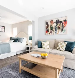 studio apartment with bed and sitting room
